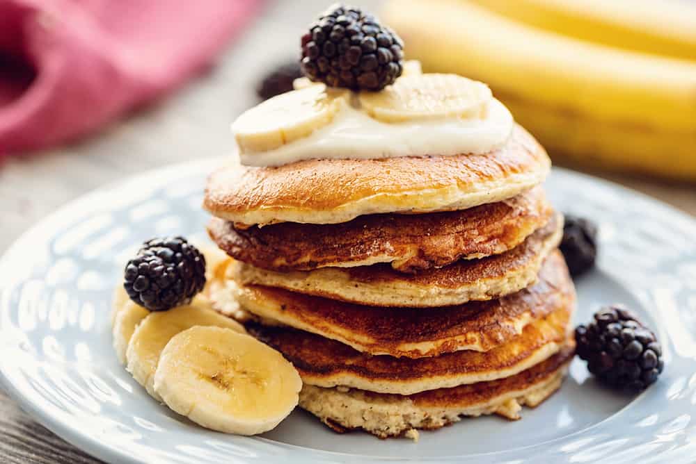 Light & Fluffy Banana Protein Pancakes on plate